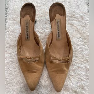 Manolo Blahnik kitten heels.